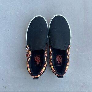 Vans Kids Black Slip-On Sneakers with Flame Pattern